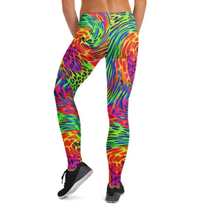 Back view of person wearing bright psychedelic all-over print leggings with neon swirl and animal patterns