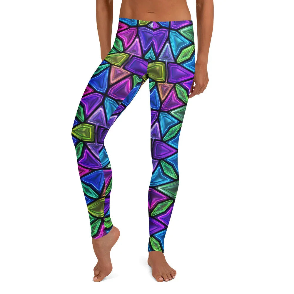 Model wearing vibrant psychedelic neon geometric print leggings from Mad Lad Designs