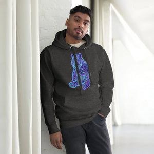 Man wearing charcoal heather hoodie with neon psychedelic bear design leaning against white brick wall