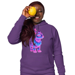 Smiling woman in purple hoodie with neon cat graphic holding lemon over one eye