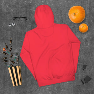 Back view of a unisex premium red pullover hoodie on dark textured surface with Halloween pumpkins, candy, glasses, and black paper bats