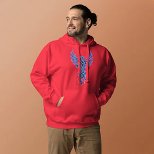 Man wearing a red unisex pullover hoodie with neon blue and purple phoenix design, tan pants, neutral backdrop