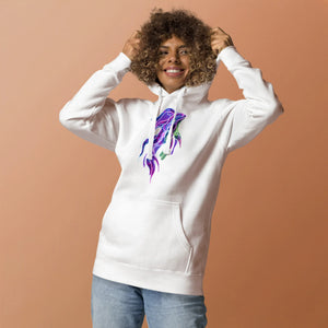 Smiling woman wearing white unisex premium pullover hoodie with vibrant psychedelic fish design against peach background