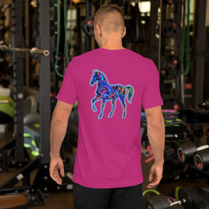 Man wearing unisex berry pink t-shirt with vibrant psychedelic horse graphic on back in gym setting