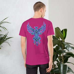 Man wearing berry unisex t-shirt with neon blue and green phoenix design on back amid indoor plants