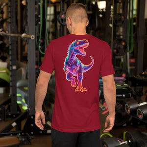 Man wearing cardinal red unisex T-shirt with neon purple and orange T-Rex dinosaur graphic in gym