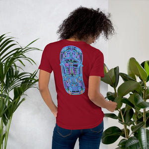 Woman wearing cardinal red unisex t-shirt with neon car blueprint graphic on back in indoor setting