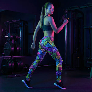 Woman in neon psychedelic leggings at gym, Mad Lad Designs vibrant streetwear