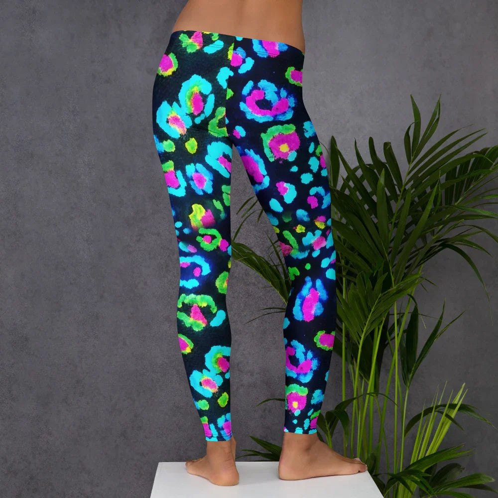 Back view of vibrant neon psychedelic all over print leggings with colorful abstract patterns