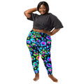 Woman modeling vibrant neon psychedelic leggings from Mad Lad Designs on white background