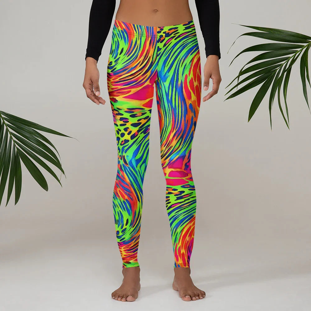 Woman wearing vibrant psychedelic all-over print leggings with neon green, blue, red, and orange swirls and spots