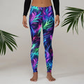 Woman wearing vibrant neon psychedelic print leggings by Mad Lad Designs, indoor setting