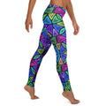 Woman wearing psychedelic neon geometric print leggings from Mad Lad Designs