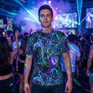 Man wearing psychedelic neon swirl t-shirt at lively nightclub with colorful laser lights and crowd