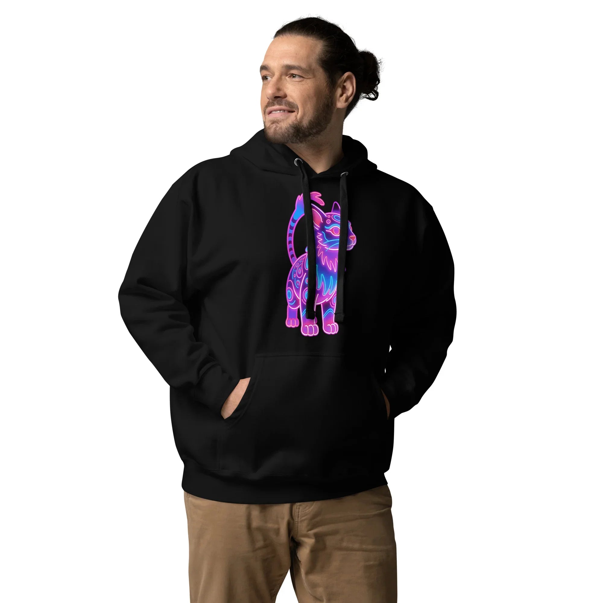 Man wearing black unisex hoodie with colorful neon cat graphic and front pocket