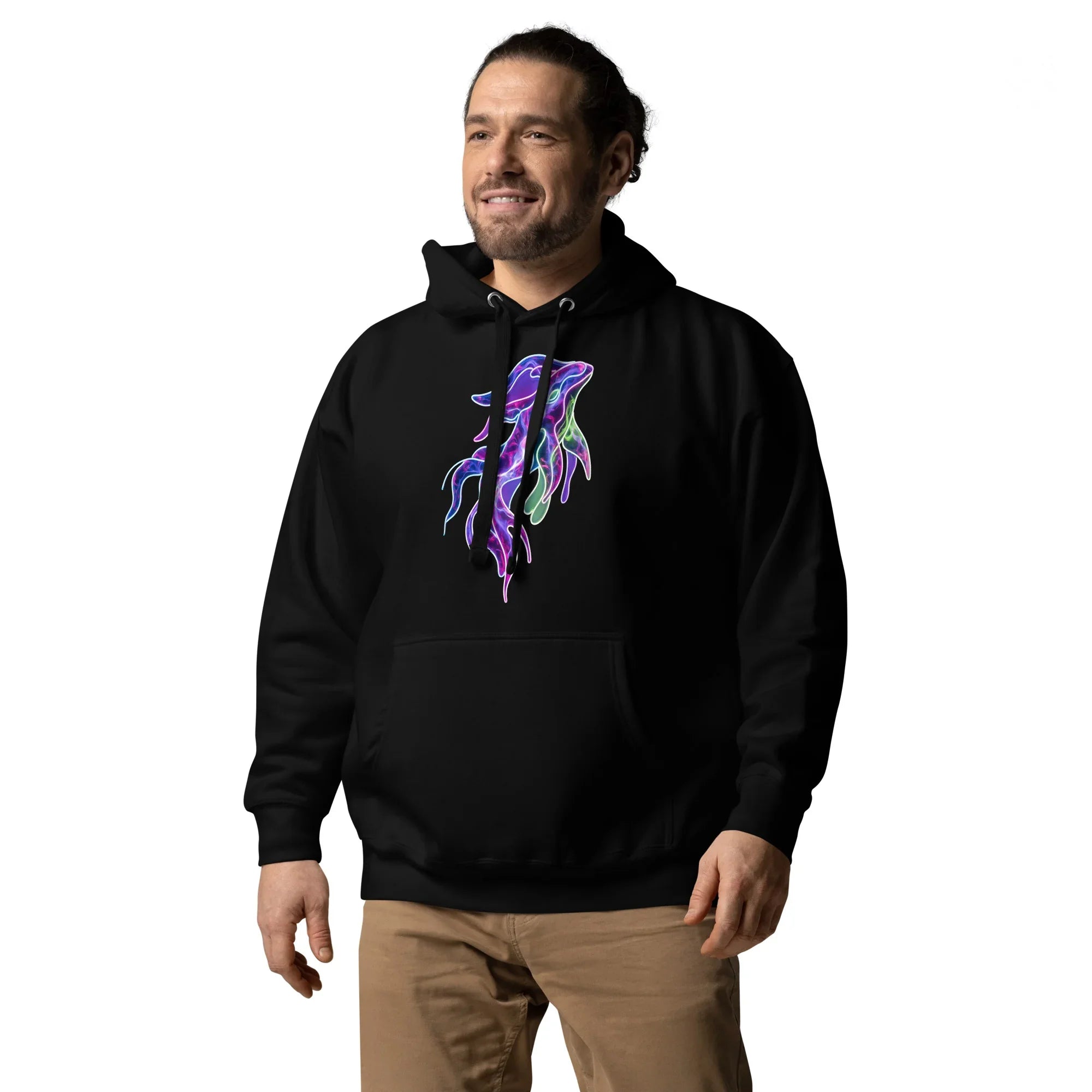 Smiling man wearing black unisex premium pullover hoodie with colorful psychedelic neon art design on chest