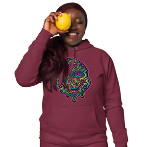 Smiling woman wearing maroon hoodie with neon psychedelic melting face design, holding lemon over eye