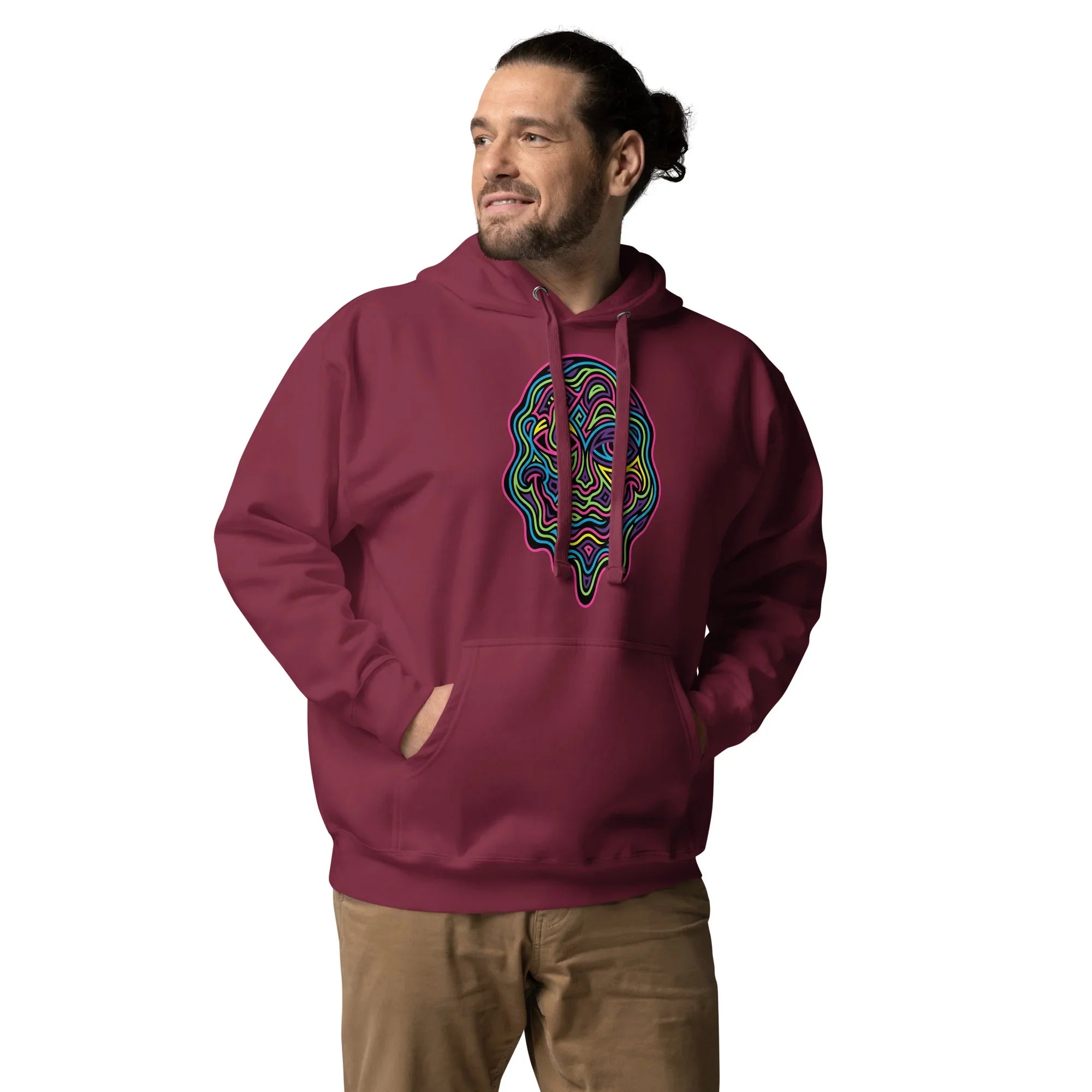 Man wearing maroon unisex premium pullover hoodie with neon psychedelic abstract face design, casual streetwear style
