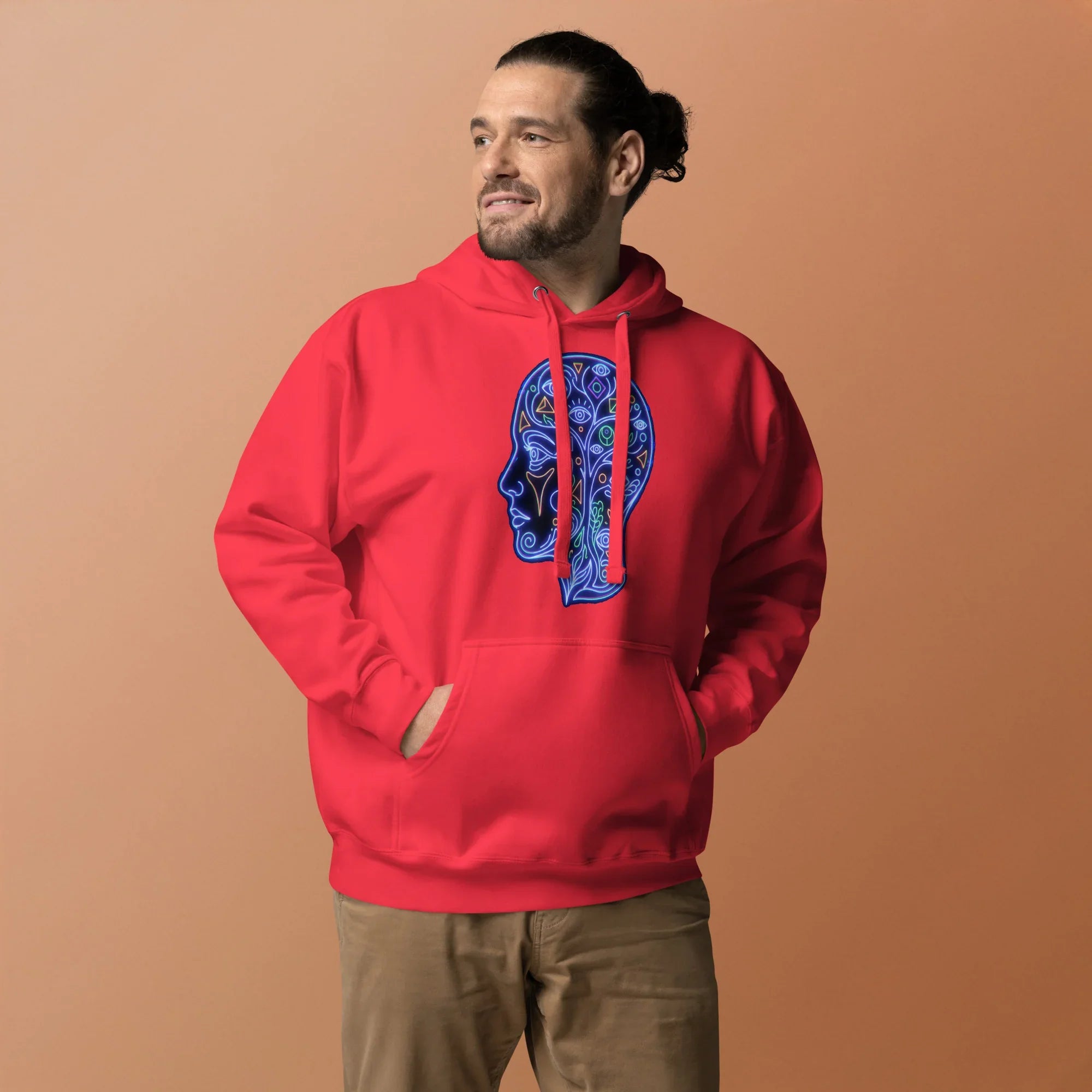 Man wearing red unisex premium pullover hoodie with psychedelic neon blue profile head design