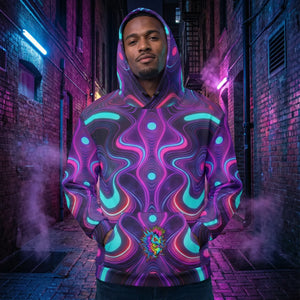 Man wearing Mad Lad Designs psychedelic neon hoodie in a vibrant urban alley at night