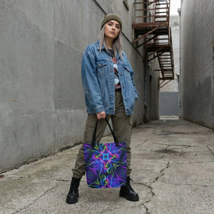 Streetwear model with neon psychedelic tote bag, denim jacket, and cargo pants in urban alley