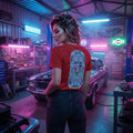 Woman in red psychedelic neon art t-shirt stands in neon-lit garage with classic car and tools