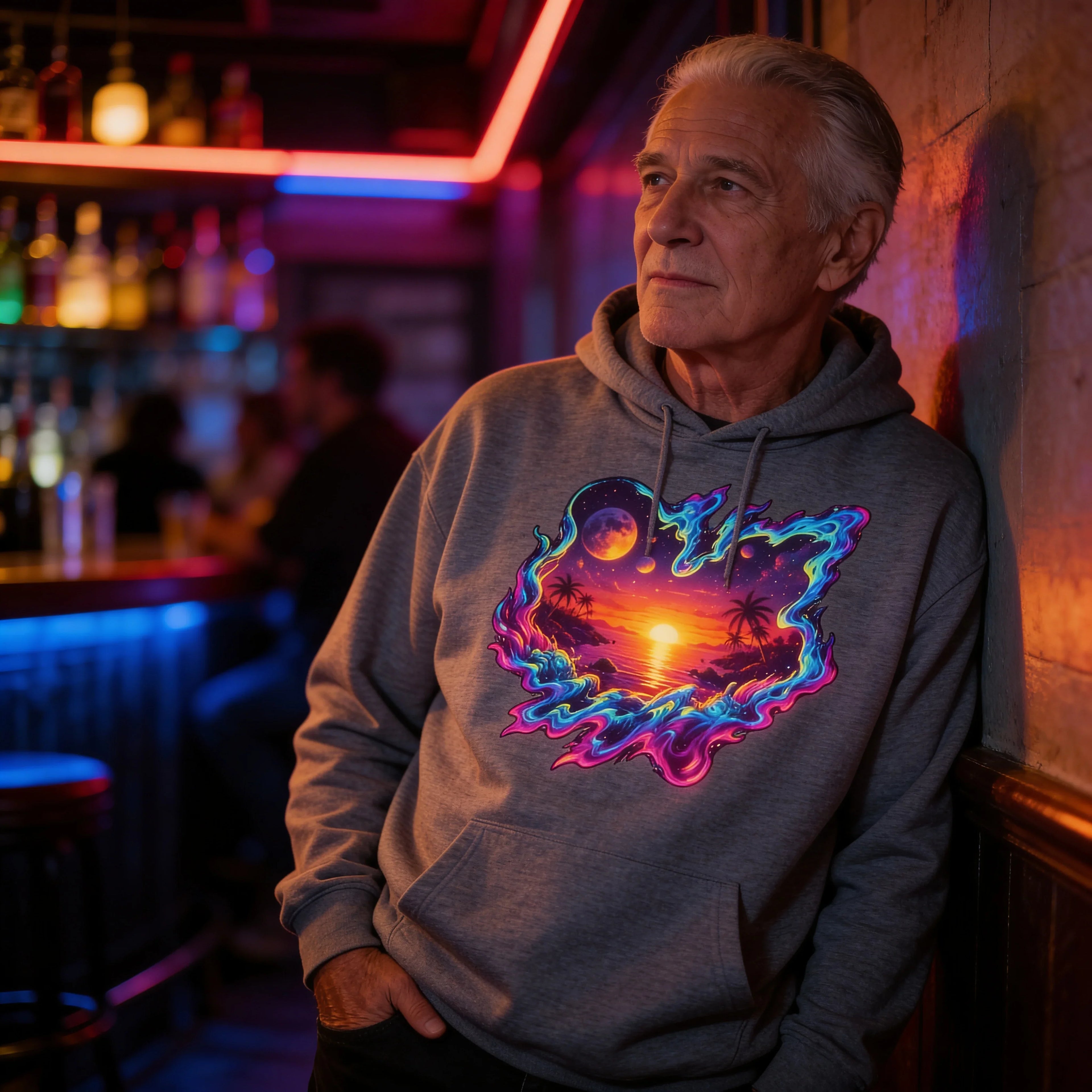 Stylish older man in a neon psychedelic sunset hoodie at a vibrant bar