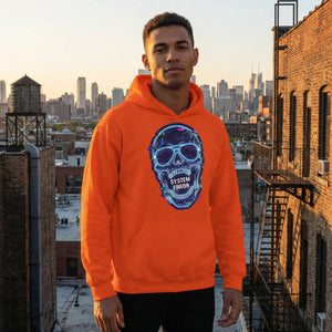 Man wearing bright orange psychedelic skull SYSTEM ERROR hoodie on urban rooftop at sunset