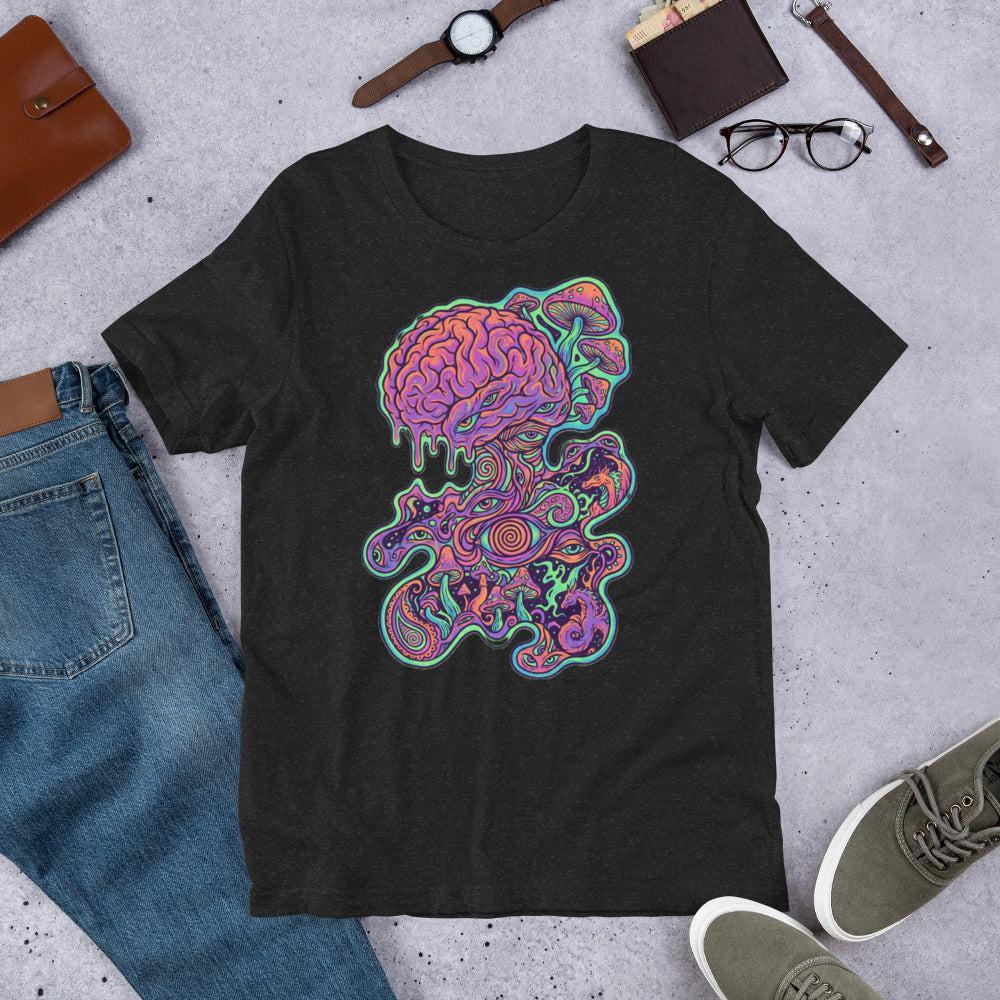 Black heather unisex t-shirt with vibrant psychedelic brain and mushroom art design, styled with jeans and accessories