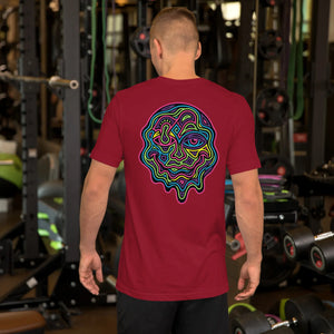 Man wearing cardinal red t-shirt with vibrant psychedelic neon abstract face design, gym background