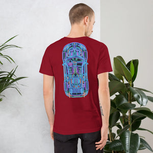 Man wearing cardinal red t-shirt with neon blue and pink car schematic design on back in indoor setting
