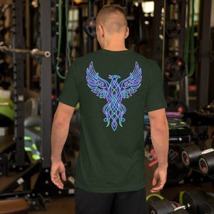 Man wearing heather emerald unisex t-shirt with neon blue and purple phoenix design in gym setting