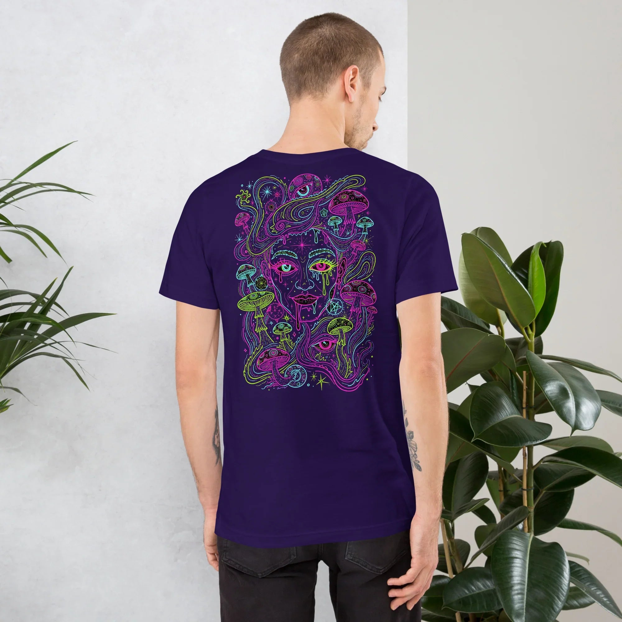 Purple unisex t-shirt with neon psychedelic mushroom and face art design on back